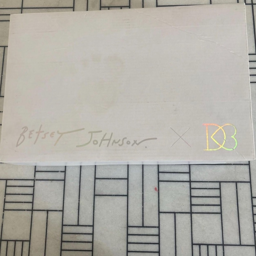 Silver and white Betsy Johnson sneakers